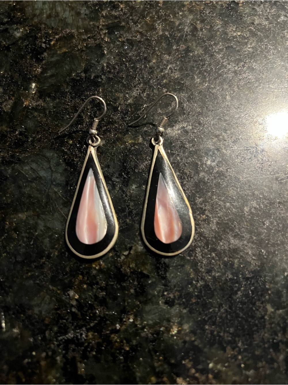Vintage Alpaca white and black with abalone and mother pearl earrings .
